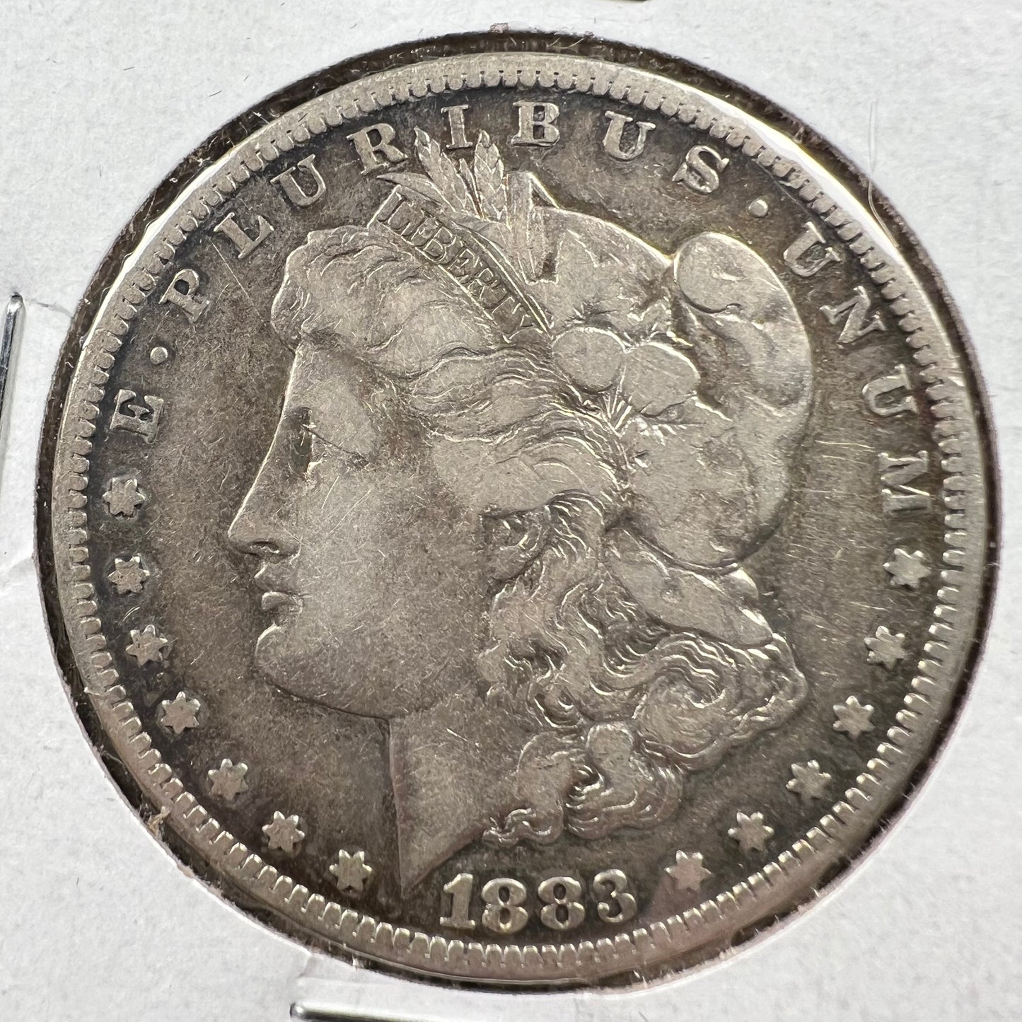 1883-CC $1 Morgan Dollar VF details (raw)